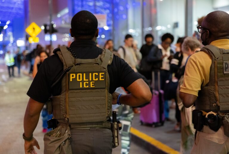 Immigration and Customs Enforcement Agents are seen working as passengers wait in long lines outside of Hartsfield-Jackson Atlanta International Airport in Atlanta, Georgia, United States on March 23, 2026. (Photo by Nathan Posner/Anadolu via Getty Images)