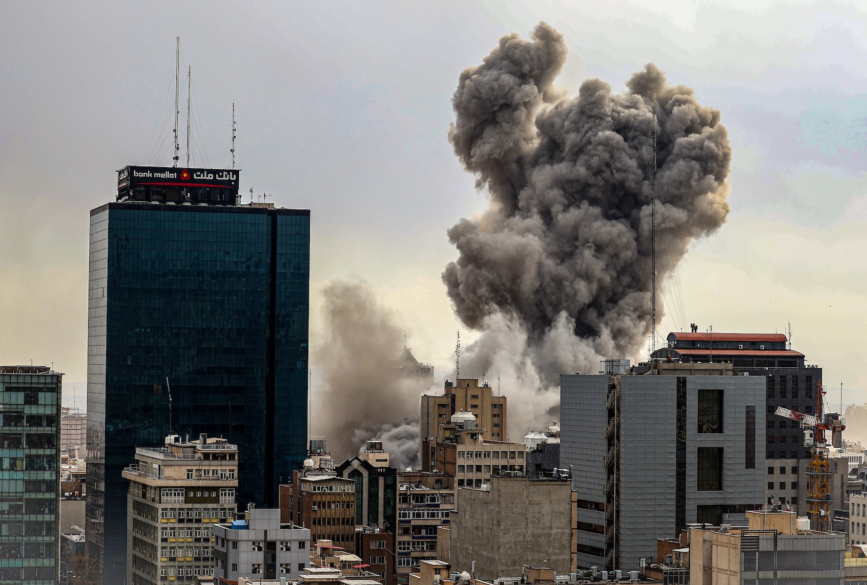 A general view of Tehran with smoke visible in the distance after explosions were reported in the city, on March 02, 2026. (Photo by Contributor/Getty Images)