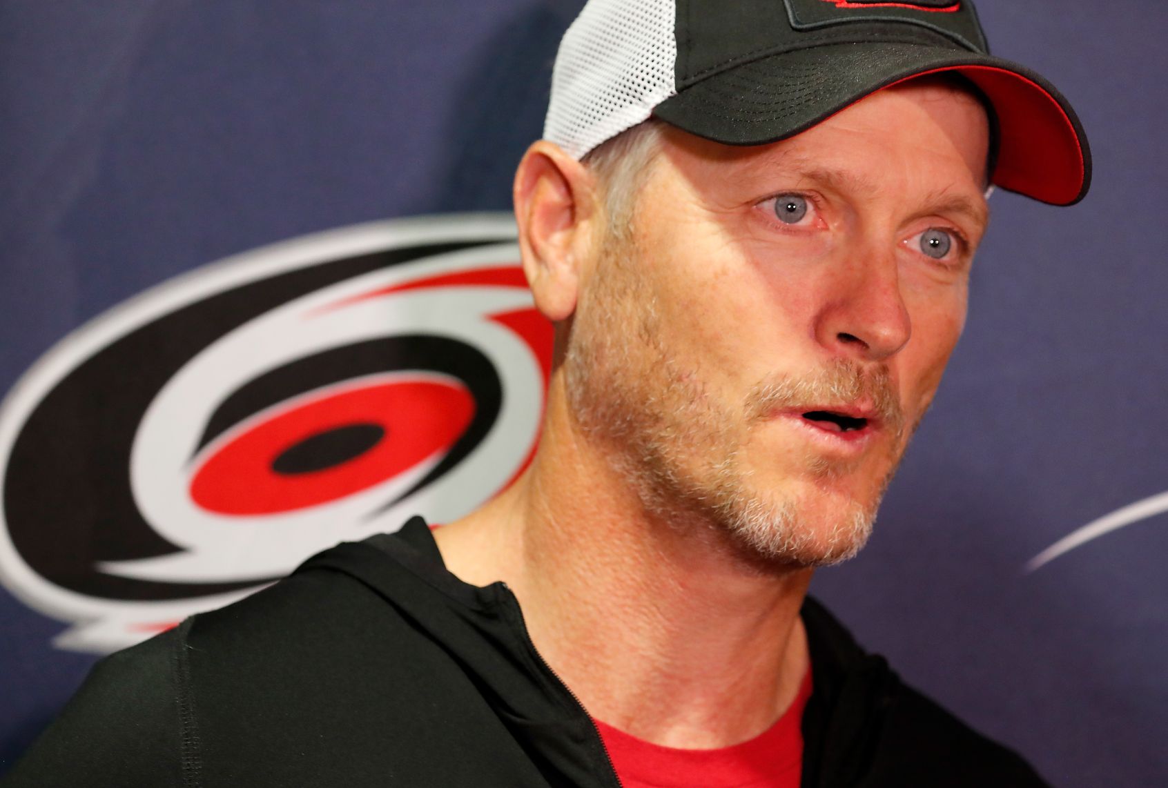Tom Dundon, pictured in 2019, owns the Carolina Hurricanes hockey team and will soon own the Portland Trail Blazers basketball franchise. (Karl DeBlaker/NHLI via Getty Images)