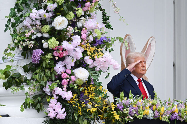 President Trump and the Easter Bunny at the White House's traditional Easter Egg Roll in 2025. His 2026 messages were less kid-friendly. (Matt McClain / Getty Images)
