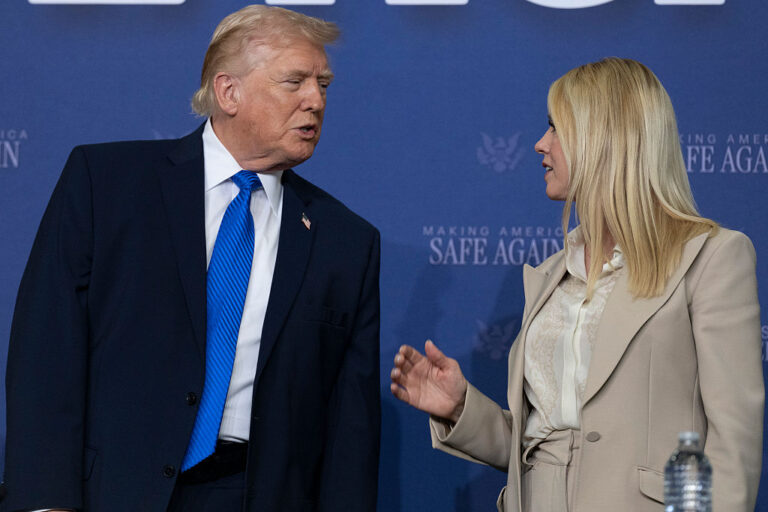 President Trump and Bondi at a meeting in Memphis on March 23, 2026, just days before he fired her from office. (Roberto Schmidt / Getty Images)