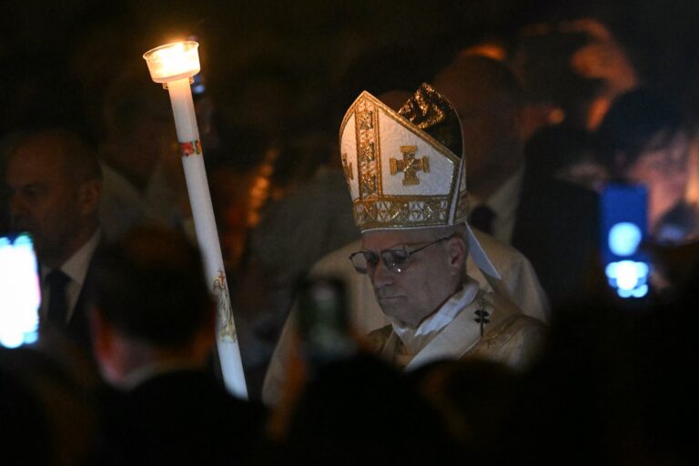 Pope Leo XIV holds the Easter candle at St. Peter's basilica in the Vatican, April 4, 2026. (Andreas Solaro/AFP via Getty Images)