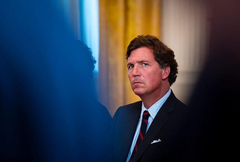 MAGA influencer Tucker Carlson (Al Drago/Getty Images)