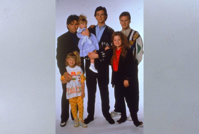 The cast of "Full House" including from left to right: John Stamos, Jodie Sweetin, Ashley or Mary-Kate Olsen, Bob Saget, Candace Cameron and David Coulier, c. 1989 (Fotos International/Getty Images)