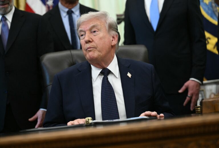 President Donald Trump is seen during a health care affordability event where he announced a deal with pharmaceutical company Regeneron to lower drug prices, in the Oval Office of the White House in Washington, DC, on April 23, 2026. (Photo by Brendan SMIALOWSKI / AFP via Getty Images)