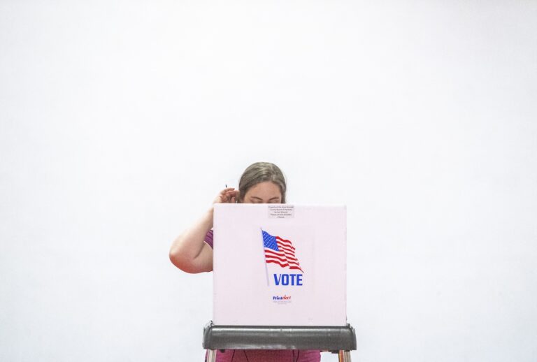 A woman casts her ballot during the Maryland state primary election at a polling station in Annapolis, Maryland, on May 14, 2024. (Photo by Jim WATSON / AFP via Getty Images)