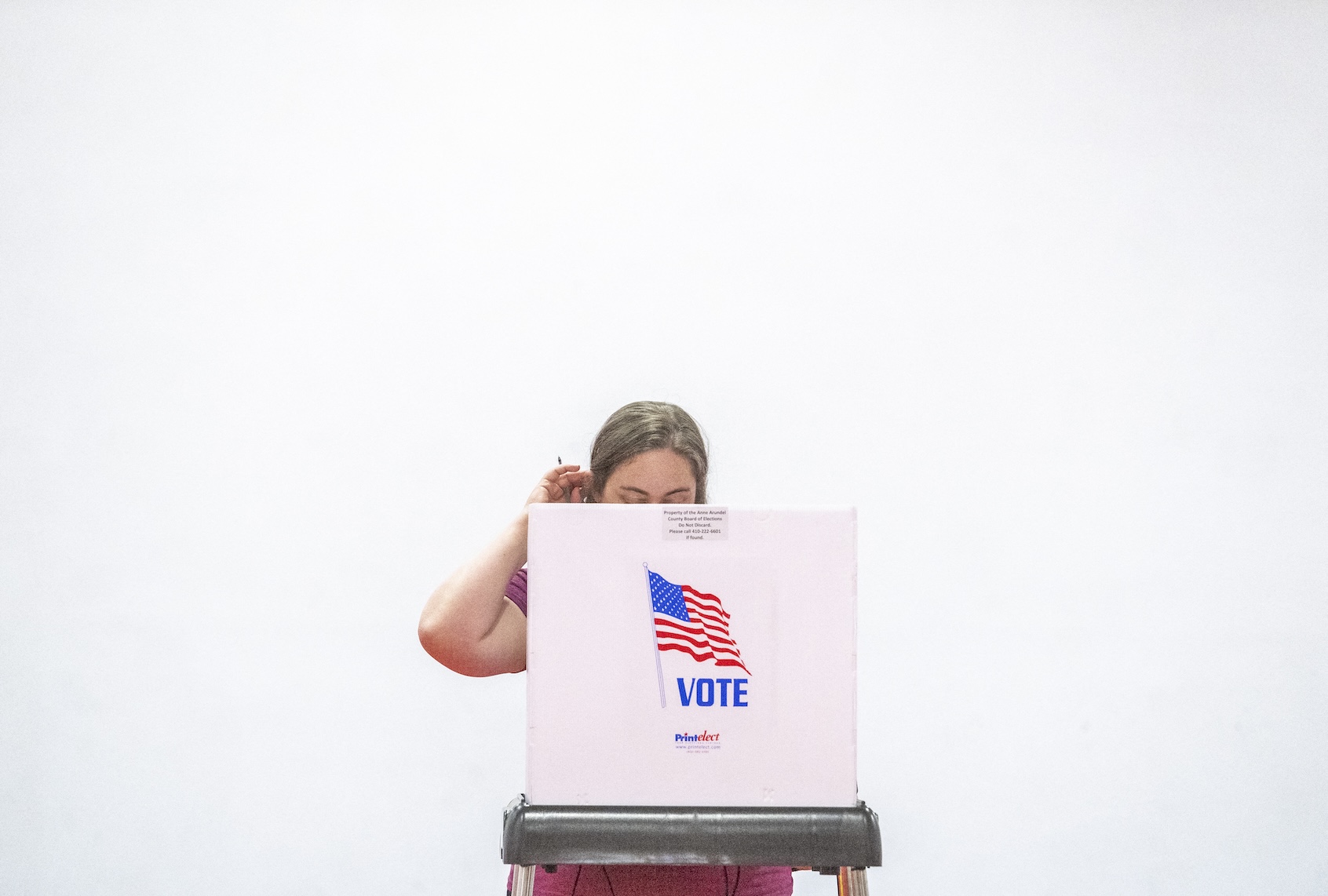 A woman casts her ballot during the Maryland state primary election at a polling station in Annapolis, Maryland, on May 14, 2024. (Photo by Jim WATSON / AFP via Getty Images)