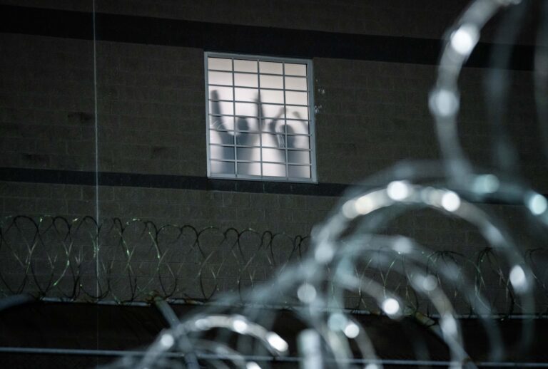 Detainees stand by a window inside the federal immigration center at Delaney Hall in Newark, where ICE is housing detained immigrants on May 26, 2026 in Newark, New Jersey. (Photo by Adam Gray/Getty Images)