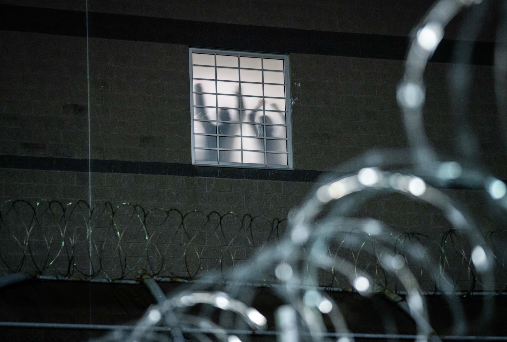 Detainees stand by a window inside the federal immigration center at Delaney Hall in Newark, where ICE is housing detained immigrants on May 26, 2026 in Newark, New Jersey. (Photo by Adam Gray/Getty Images)
