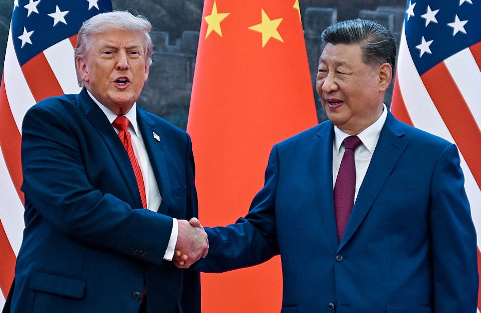 President Donald Trump with his Chinese counterpart Xi Jinping (Kenny HOLSTON / POOL / AFP via Getty Images)