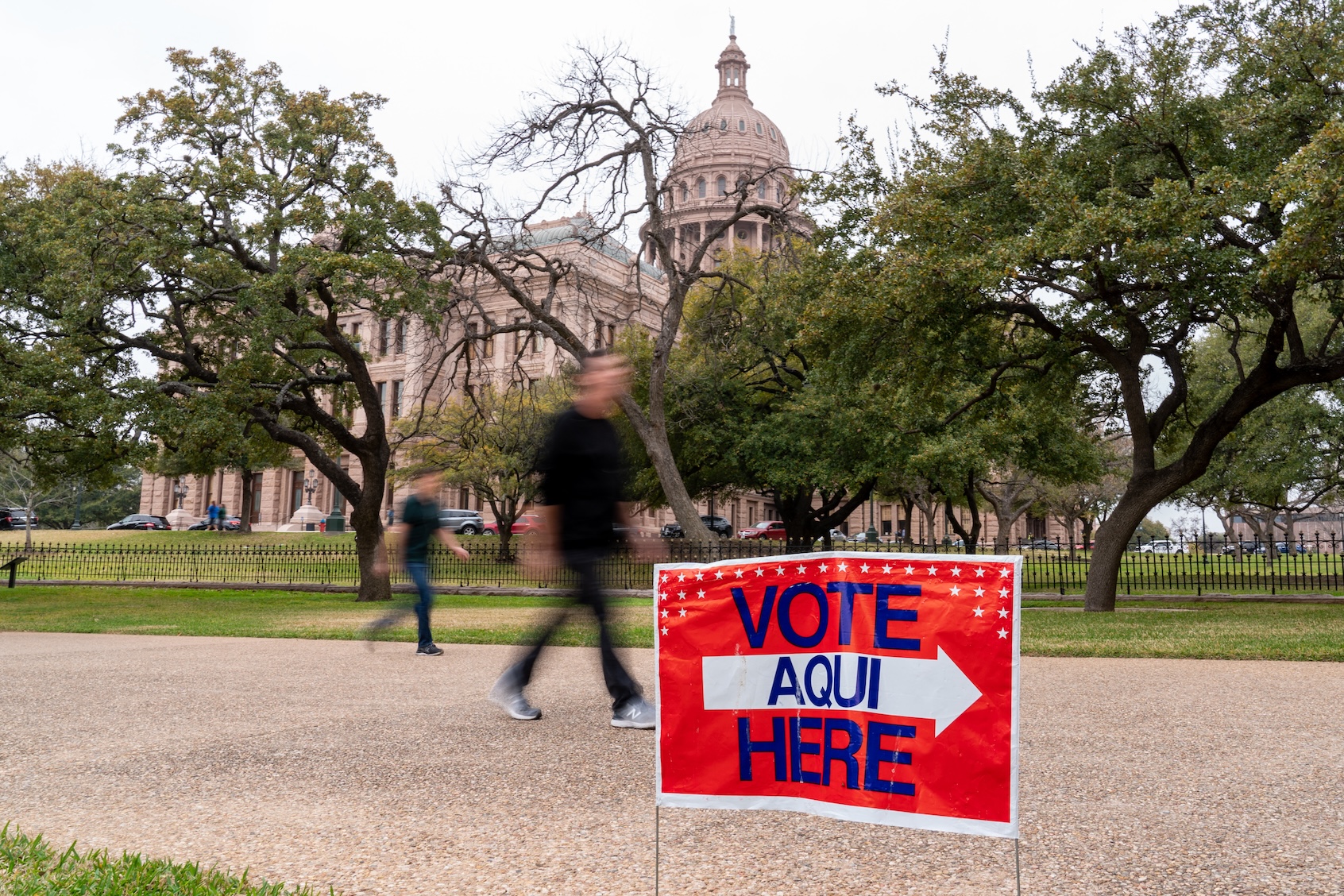 Voters  head to the Sam Houston State Office Building near the Texas State Capitol to cast their ballot during the Democratic presidential primary in Austin, Texas on Super Tuesday, March 3, 2020. Fourteen states and American Samoa are holding presidential primary elections, with over 1400 delegates at stake. Americans vote Tuesday in primaries that play a major role in who will challenge Donald Trump for the presidency, a day after key endorsements dramatically boosted Joe Biden's hopes against surging leftist Bernie Sanders. The backing of Biden by three of his ex-rivals marked an unprecedented turn in a fractured, often bitter campaign. (Photo by SUZANNE CORDEIRO/Getty Images)