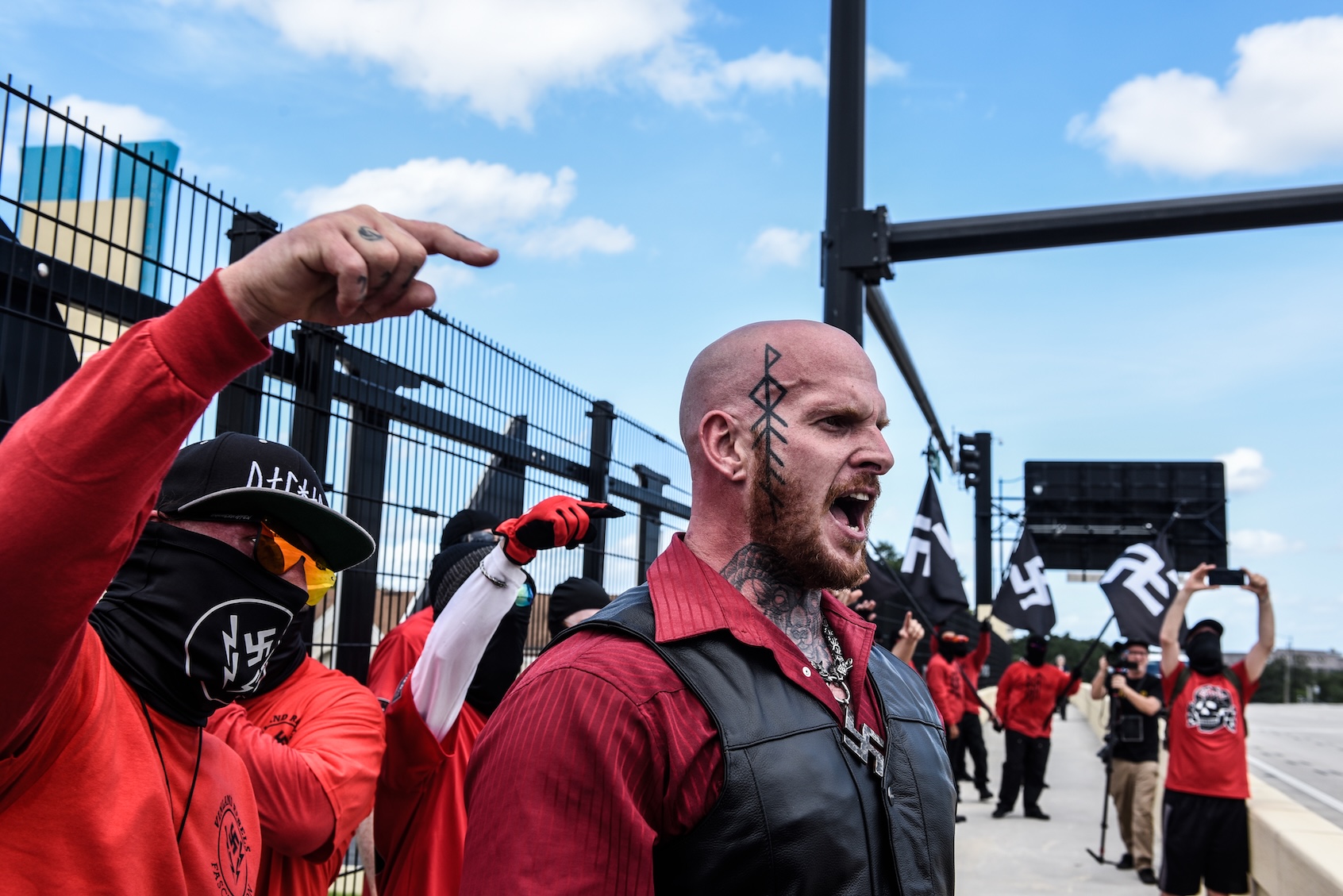 Christopher âHammerâ Pohlhaus leads a rally with neo-Nazi groups Blood Tribe, and Goyim Defense League on September 2, 2023 in Orlando, Florida. An event touted as the "Red Shirts March" and a show of unity for Neo-Nazis attracted about 100 people to participate. (Photo by Stephanie Keith/Getty Images)