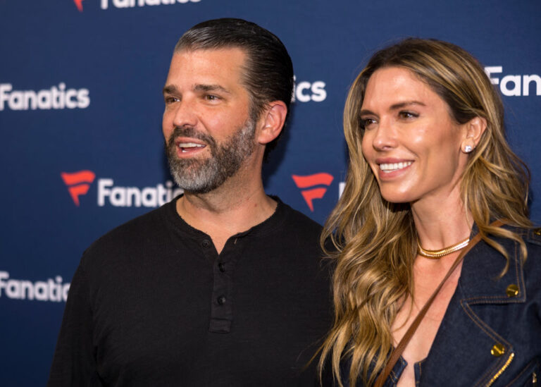 Donald Trump Jr. and now wife Bettina Anderson have been together since 2024, engaged since December 2025. Trump's father will be skipping their wedding weekend, blaming it on international issues. (Christopher Polk / Getty Images)