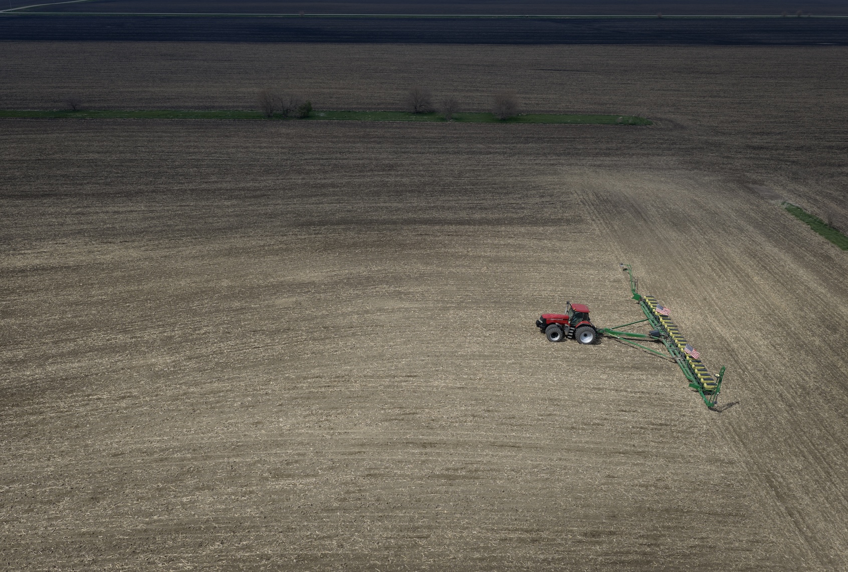 An aerial view shows Alan Montag, a third-generation Iowa farmer, planting soybeans on farmland he leases on May 06, 2026 near West Bend, Iowa. As the spring planting season moves into full swing, farmers are facing big spikes in fuel and fertilizers costs overs last spring due to the war with Iran. (Photo by Scott Olson/Getty Images)