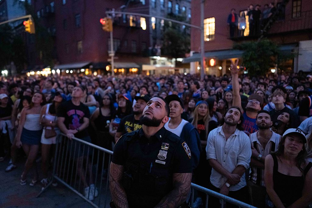 Knicks fans all over the New York metro area gathered to watch Game 5 and their team win their first championship since 1973. (Adam Gray / Getty Images)