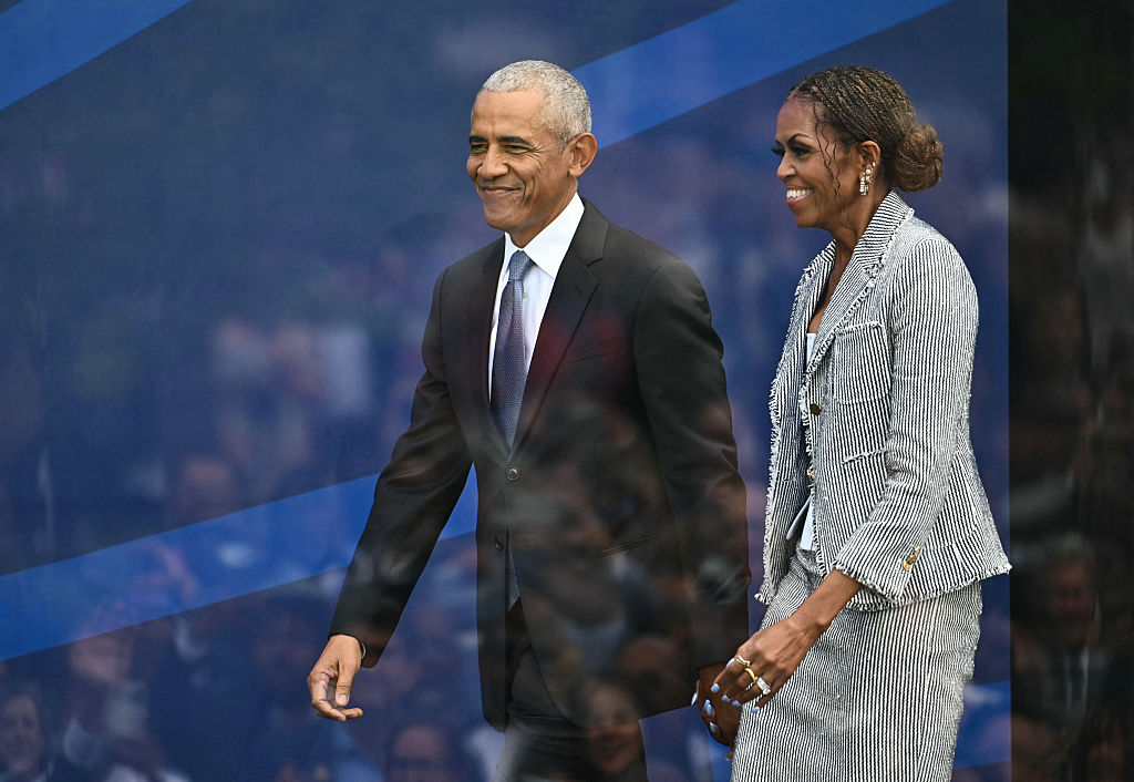 Barack and Michelle Obama attend the opening ceremony of the Obama Presidential Center in Chicago. Both spoke about community, compassion and hope. (Kent NISHIMURA / Getty Images)