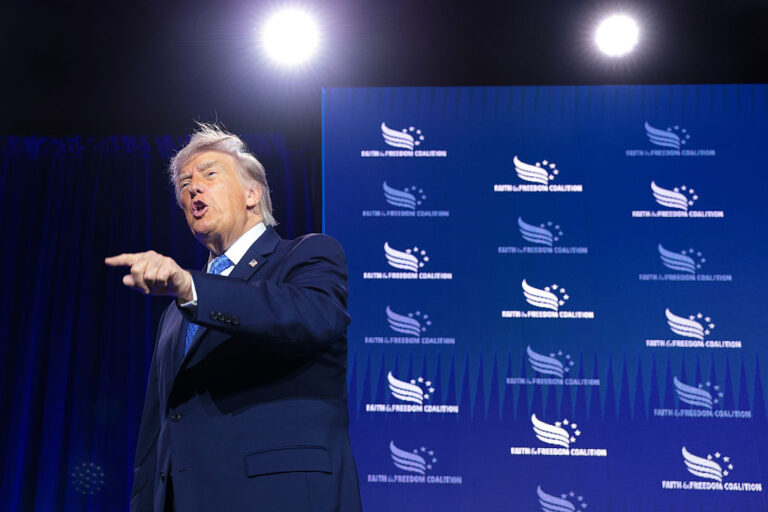 President Trump, at this year's Faith & Freedom conference, spoke to a crowd of evangelicals warning them about the "greatest threat" to America — the "godless communist" democrats. (Anna Moneymaker / Getty Images)