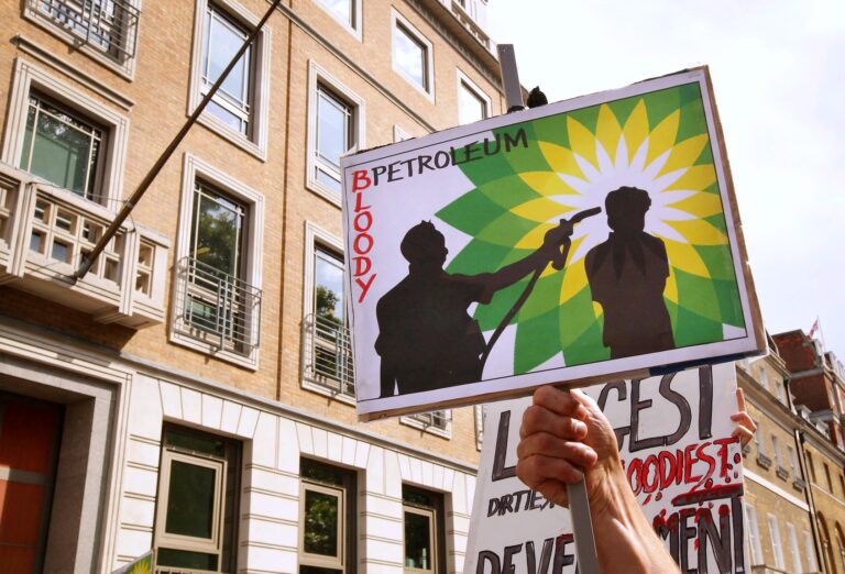 Climate change protesters blockade the entrance to the British Petroleum headquarters on September 1, 2009 in London, England. (Photo by Peter Macdiarmid/Getty Images)