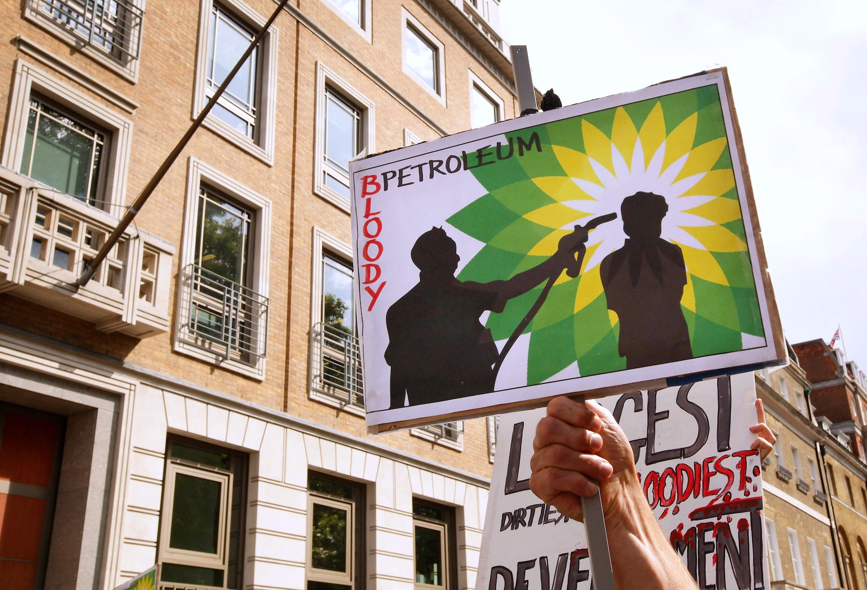 Climate change protesters blockade the entrance to the British Petroleum headquarters on September 1, 2009 in London, England. (Photo by Peter Macdiarmid/Getty Images)
