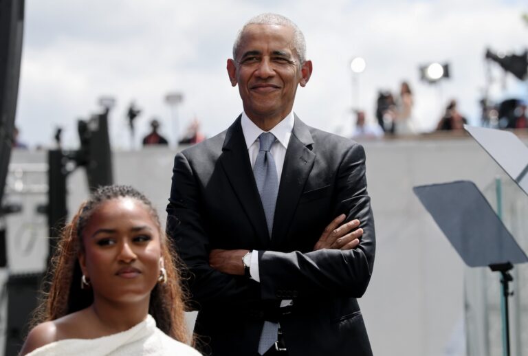 Former President Barack Obama stands on stage with daughter Sasha Obama during the dedication ceremony for the opening of the Barack Obama Presidential Center in John Lewis Plaza on June 18, 2026 in Chicago, Illinois. (Photo by Win McNamee/Getty Images)
