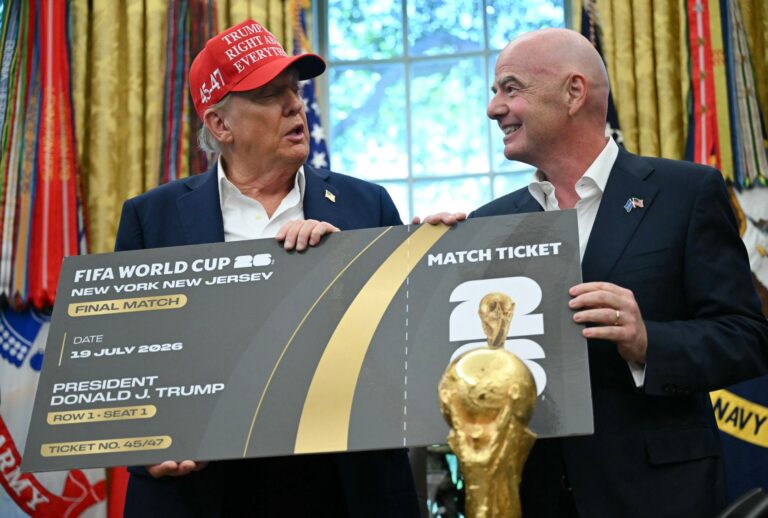 FIFA president Gianni Infantino presents President Donald Trump a World Cup ticket on August 22, 2025. (ANDREW CABALLERO-REYNOLDS/AFP via Getty Images)