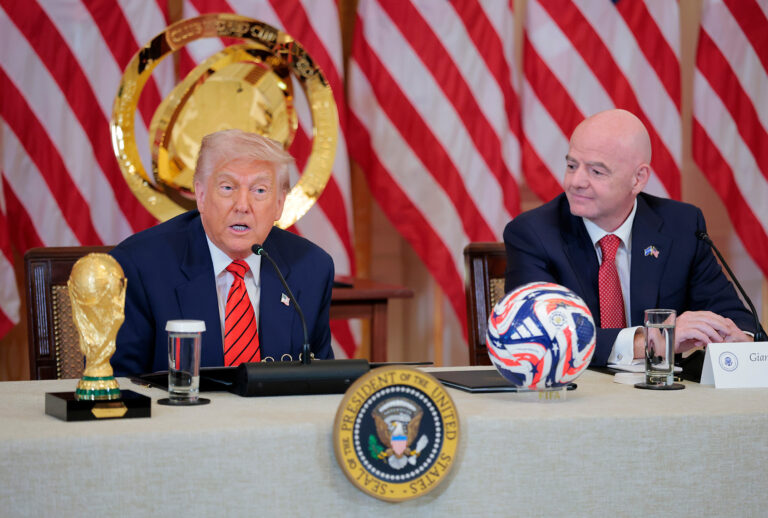 U.S. President Donald Trump speaks alongside FIFA President Gianni Infantino during a meeting with the White House Task Force for the 2026 World Cup. (Anna Moneymaker / Getty Images)