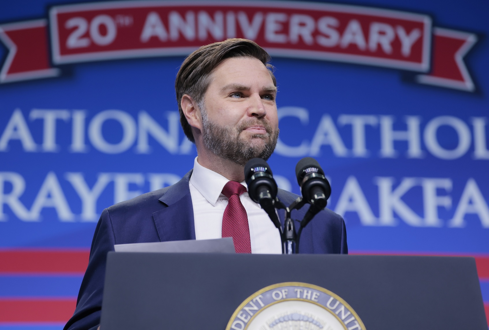 Vice President J.D. Vance speaks during the 20th annual National Catholic Prayer Breakfast at the Walter E. Washington Convention Center on February 28, 2025 in Washington, DC. During his remarks Vance spoke about his journey to becoming Catholic and how his faith has influenced his political career. (Photo by Anna Moneymaker/Getty Images)