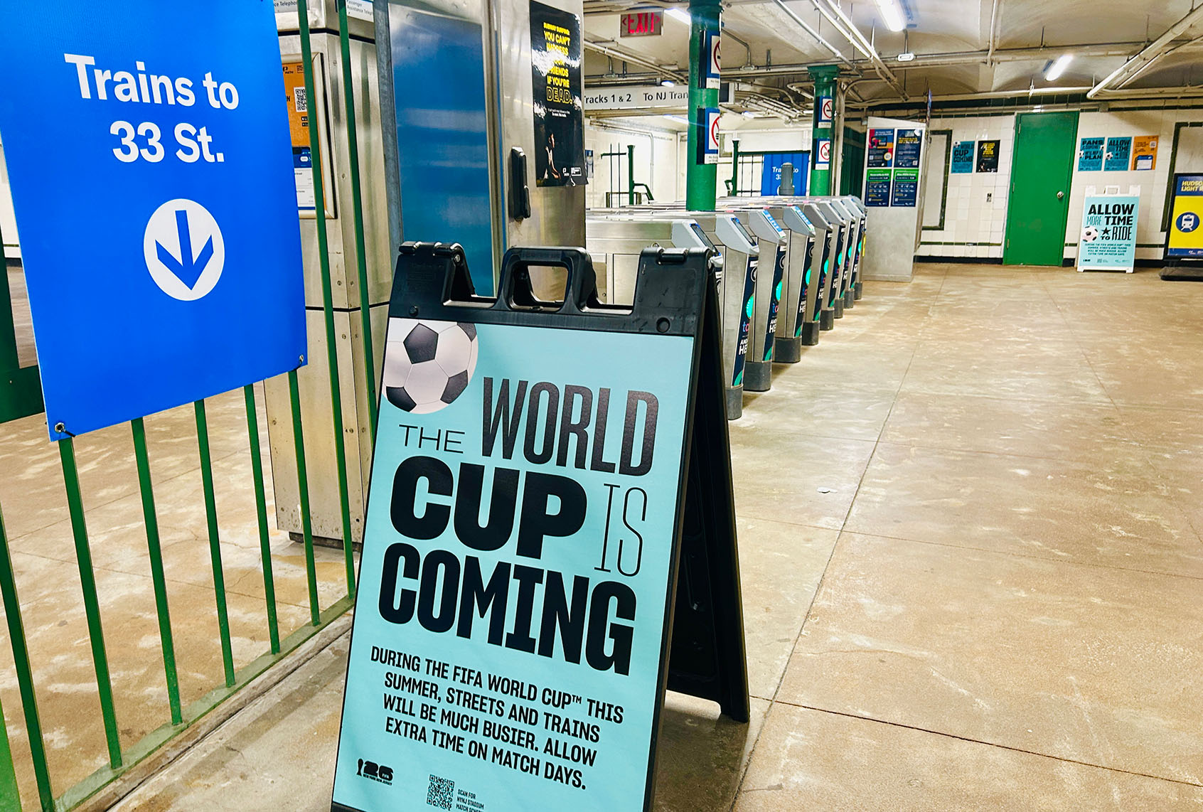 World Cup is Coming signs, warning about crowds and delays in subway station at PATH train Station, Manhattan, New York. (Lindsey Nicholson/UCG/Universal Images Group via Getty Image)