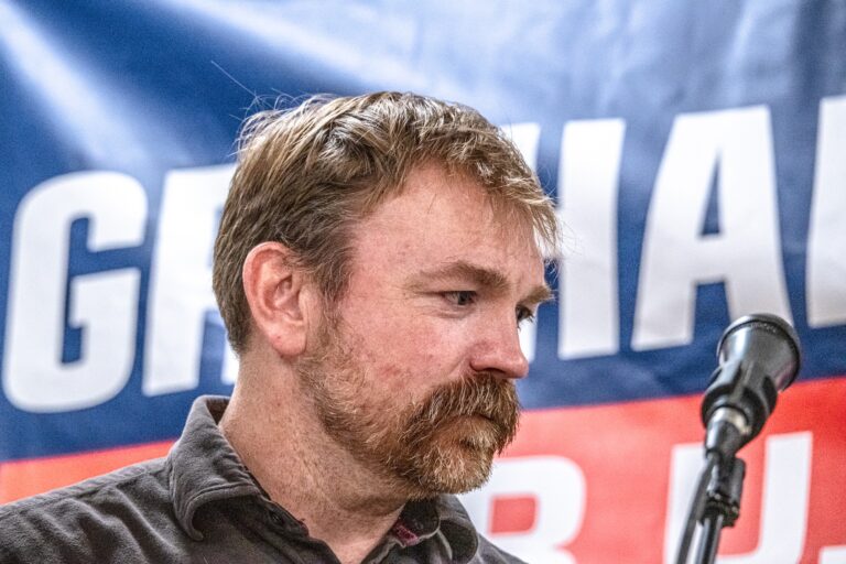 Graham Platner speaks to voters at a town hall at the Elks Lodge 188 on June 7, 2026 in Portland, Maine.. (Photo by Laura Brett/Getty Images)