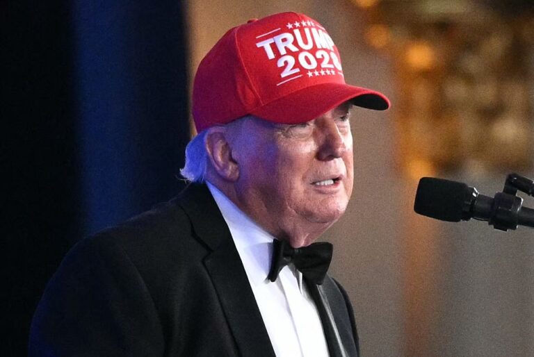 Donald Trump dons a "Trump 2028" red hat to close out his rambling attack on the press at the WHCA make-up dinner, rescheduled after a shooting at the April event. (Mandel NGAN / Getty Images)