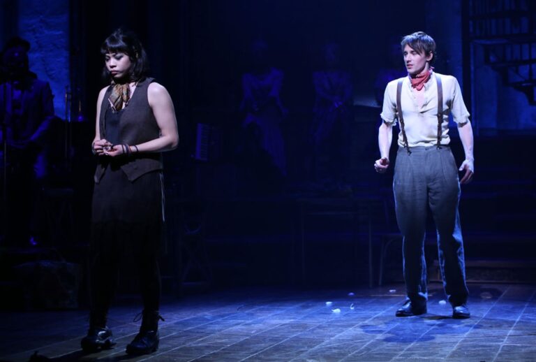 In a scene from "Hadestown," actors Eva Noblezada and Reeve Carney demonstrate the capacity to hold another’s reality without collapsing it into their own. (Walter McBride/Getty Images)