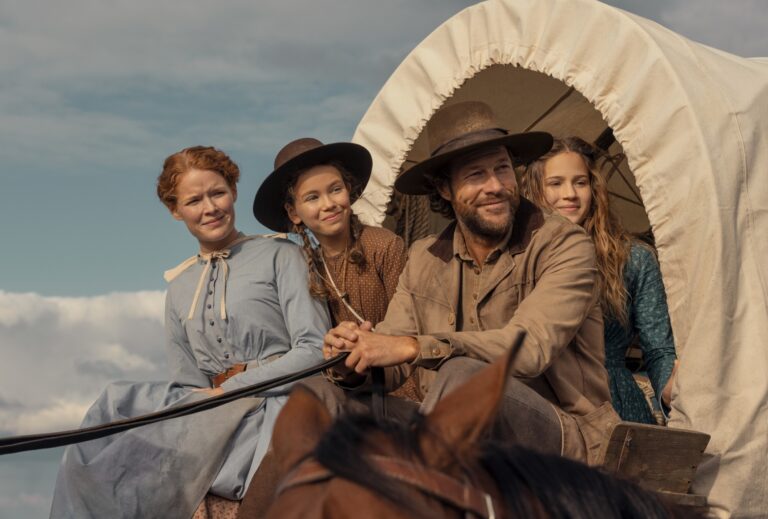 Crosby Fitzgerald as Caroline Ingalls, Luke Bracey as Charles Ingalls, Skywalker Hughes as Mary Ingalls, Alice Halsey as Laura Ingalls in "Little House on the Prairie." (Eric Zachanowich/Netflix © 2026)