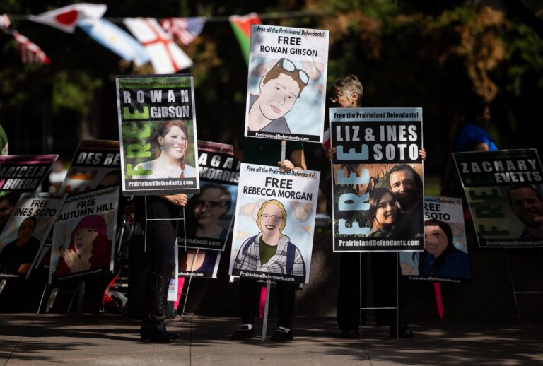 Protestors hold up signs with faces of the Prairieland defendants outside of the Eldon B. Mahon U.S. Courthouse in Fort Worth, Texas, Wednesday, July 1, 2026. (Juan Figueroa/The Dallas Morning News via Getty Images)