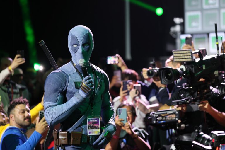 Ryan Reynolds in his Deadpool costume speaks during 2026 Comic-Con International in San Diego, July 25, 2026. (Amy Sussman/Getty Images)