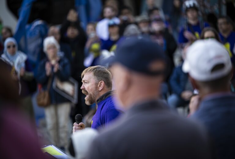 Graham Platner speaks during a May Day rally organized by local unions, on May 1, 2026 outside City Hall in Portland, Maine. (Photo by Graeme Sloan/Getty Images)