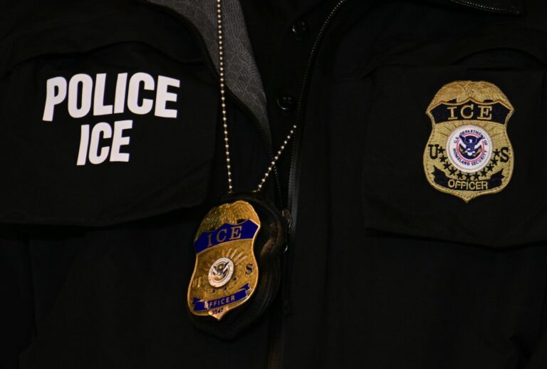 An ICE patch and badge are seen on a Department of Homeland Security agent on January 22, 2026 in Minneapolis, Minnesota. (Photo by Jim Watson - Pool/Getty Images)