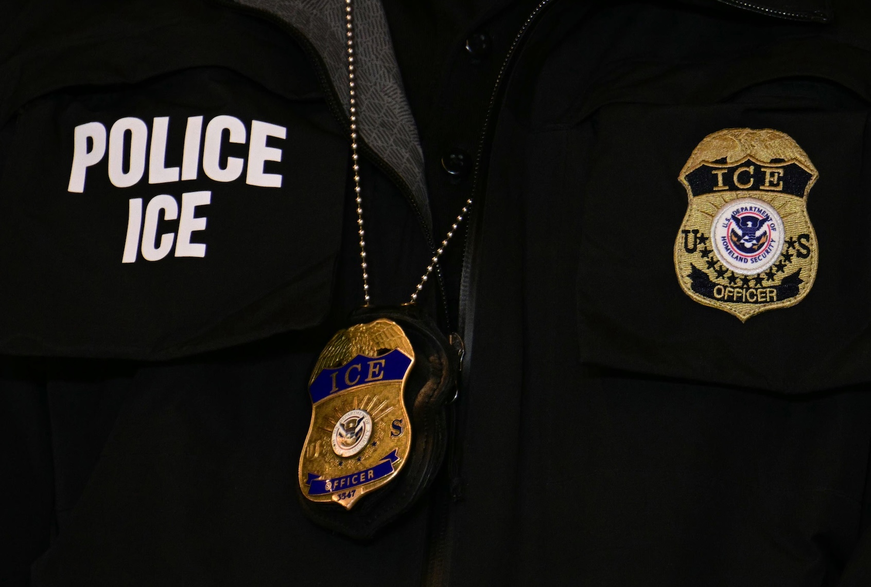 An ICE patch and badge are seen on a Department of Homeland Security agent on January 22, 2026 in Minneapolis, Minnesota. (Photo by Jim Watson - Pool/Getty Images)