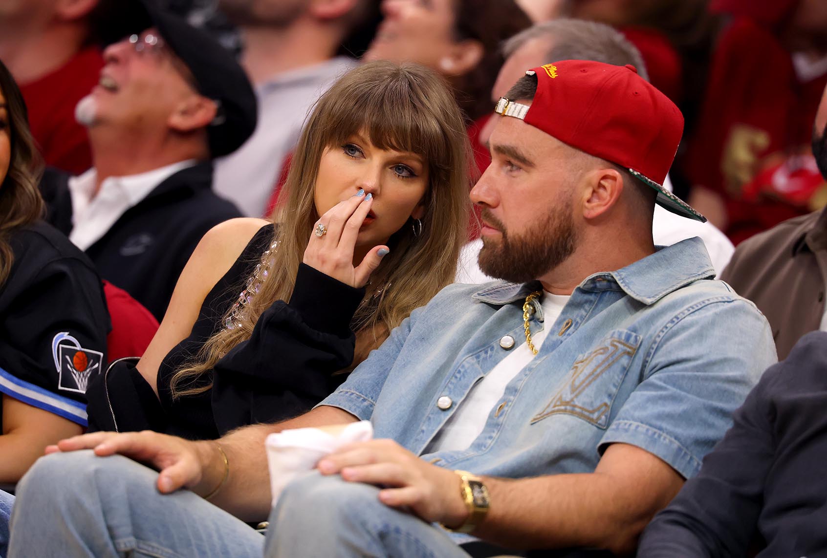 Singer Taylor Swift and Travis Kelce of the Kansas City Chiefs attend Game Three between the New York Knicks and the Cleveland Cavaliers in the NBA Eastern Conference Finals on May 23, 2026. (Gregory Shamus/Getty Images)