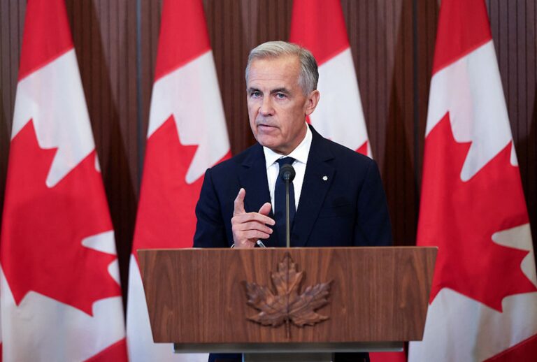 Canadian Prime Minister Mark Carney speaks at a press conference in Ottawa, Ontario, on Aug. 22, 2026, after trade talks with the U.S. collapsed. (Dave Chan / AFP)