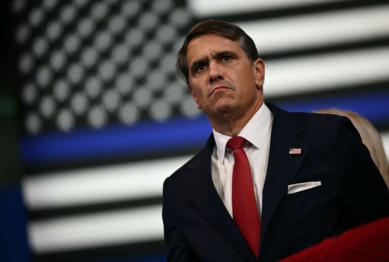Attorney General Todd Blanche looks on as  President Donald Trump speaks on Aug. 14, 2026. (Kent NISHIMURA / AFP via Getty Images)