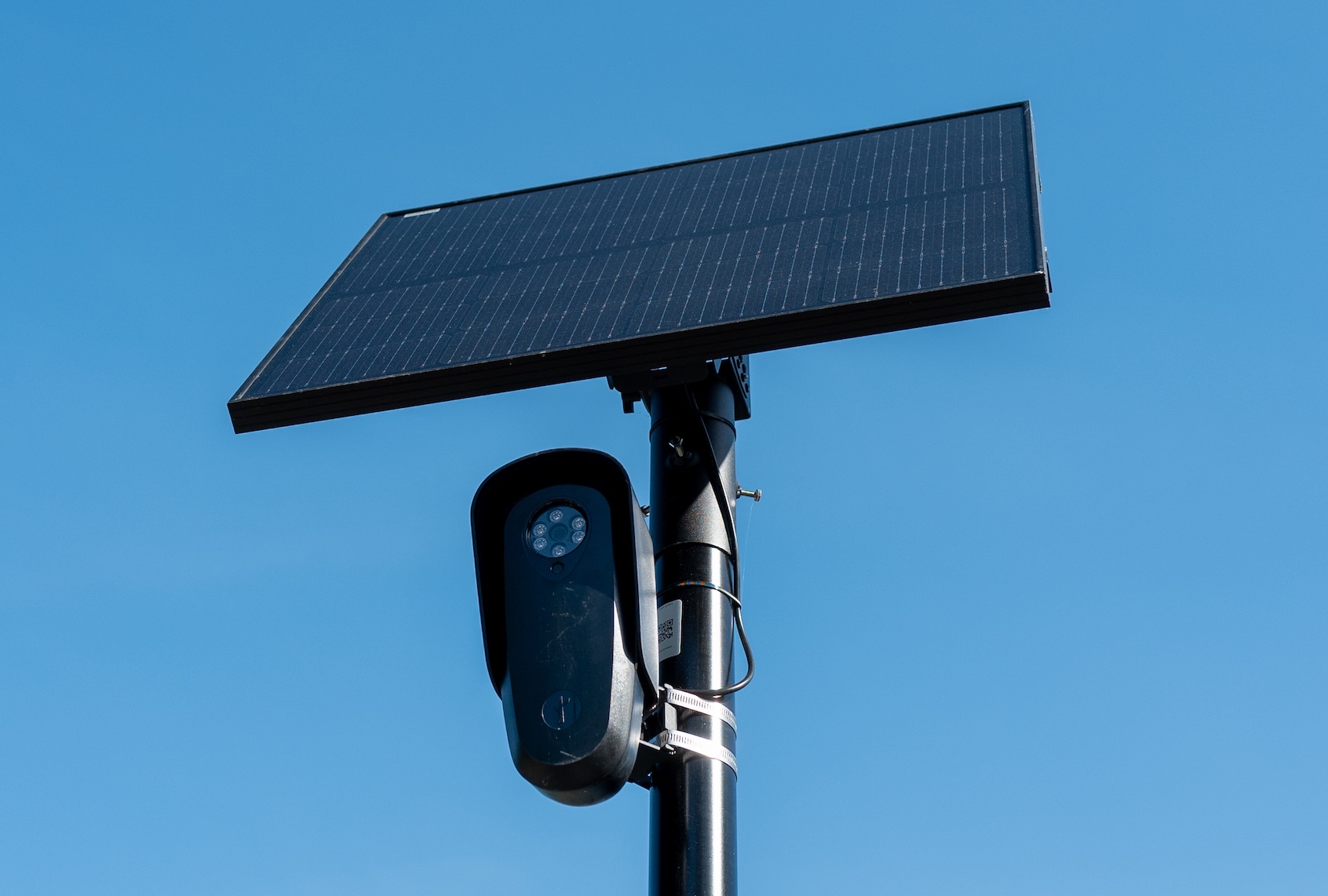 Flock license plate reader and camera with solar panel against a blue sky, Pleasant Hill, California, April 16, 2026. (Photo by Smith Collection/Gado/Getty Images)