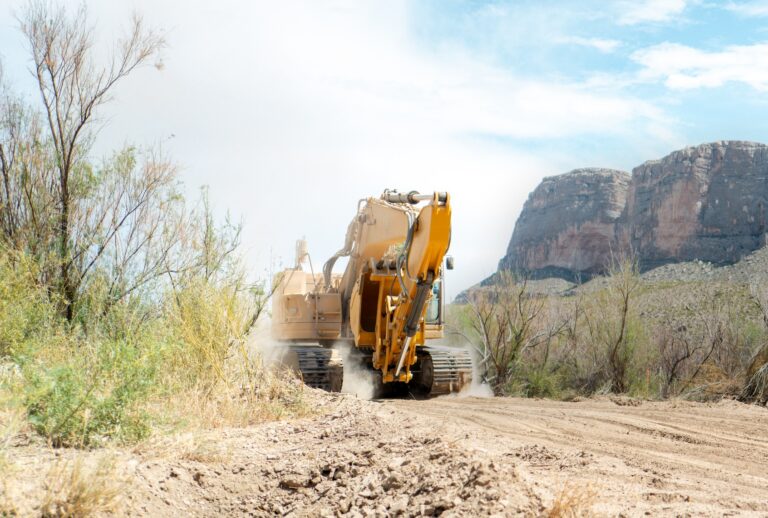 An excavator plows through land during construction for a section of border wall near Santa Elena Canyon on August 14, 2026 in Big Bend National Park, Texas. Contractors have begun construction of the Trump administration’s 30-foot southern border wall through Big Bend National Park. (Photo by Brandon Bell/Getty Images)