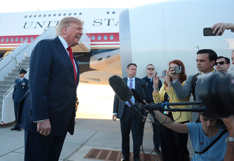 President Trump addresses the press gaggle outside Air Force One. The animosity between the two continues with new media bans. (Anna Moneymaker / Getty Images)