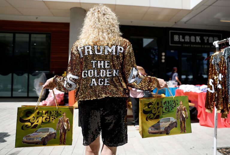 A supporter of President Donald Trump wears a glitter jacket ahead of the 2026 Republican National Committee (RNC) Midterm Convention at the American Airlines Center on Sept. 8, 2026, in Dallas. (Justin Sullivan/Getty Images)