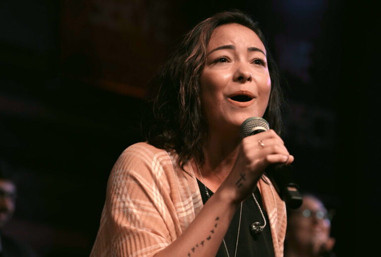 Mica Miller worships at Solid Rock Church in a clip from Netflix's "Death of the Pastor's Wife." (Courtesy of Netflix)