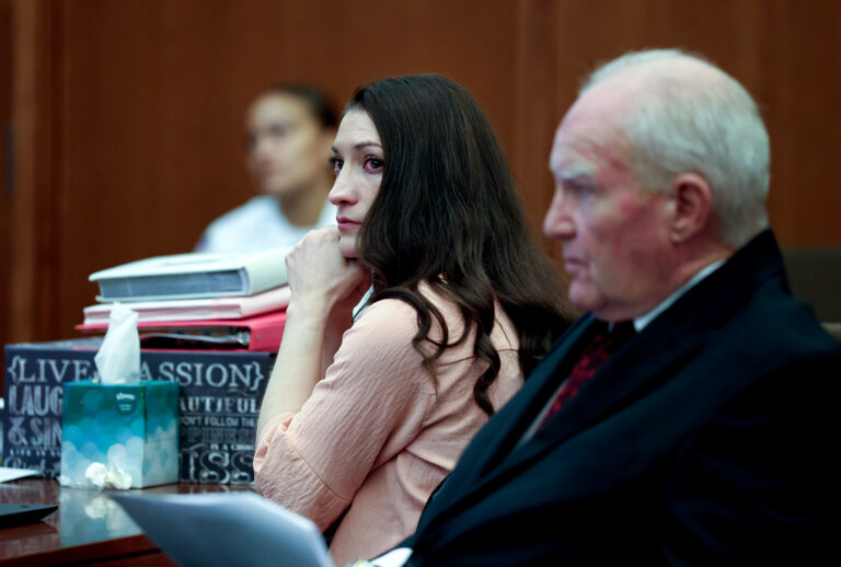 Lindsay Clancy and defense attorney Kevin Reddington listen to testimony at Plymouth Superior Court, Aug. 18, 2026. (Jonathan Wiggs/The Boston Globe via Getty Images)