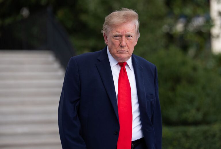 President Donald Trump walks on the South Lawn as he departs the White House on Oct. 12, 2026. (Aaron Schwartz/Getty Images)