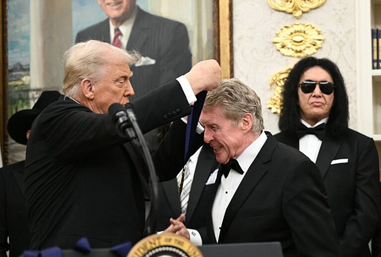 Broadway star Michael Crawford receives the Kennedy Center Honors medal from President Donald Trump at the White House on Dec. 6, 2025. (Brendan SMIALOWSKI / AFP via Getty Images)