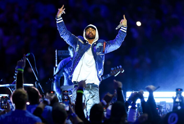 Eminem performs during halftime of a Thanksgiving NFL football game between the Detroit Lions and the Green Bay Packers on Nov. 27, 2025, in Detroit, Michigan. (Kevin Sabitus/Getty Images)
