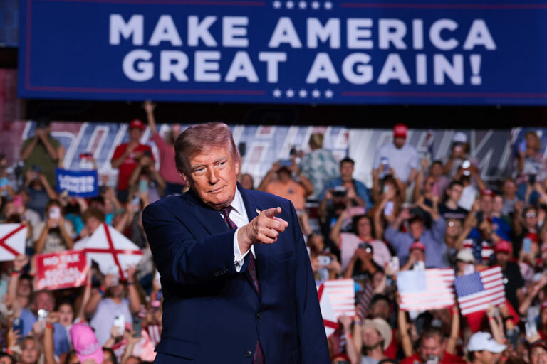 President Trump is spending the last days before the midterms campaigning in deep-red states. He continues to make grandiose promises to his most loyal supporters. (Anna Moneymaker / Getty Images)